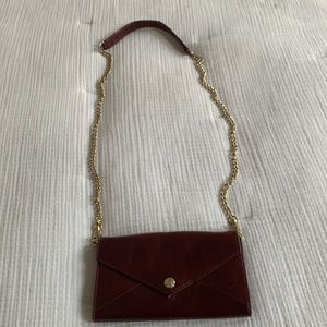 Maroon Rebecca Minkoff cross body clutch purse